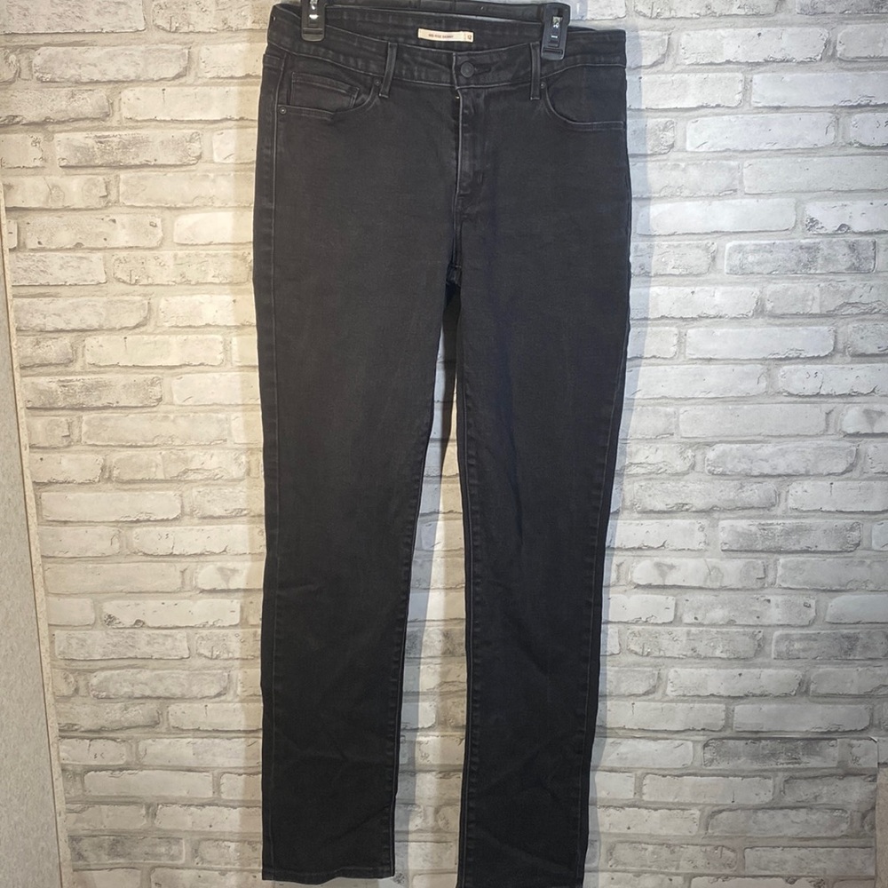 Levi’s black mid rise skinny sz12
